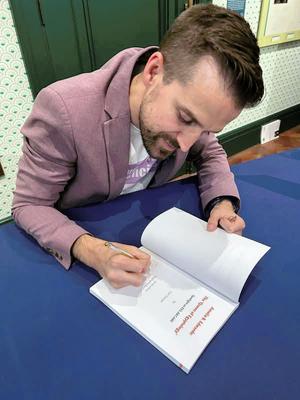 ABE Spotlight - Signing.JPG
