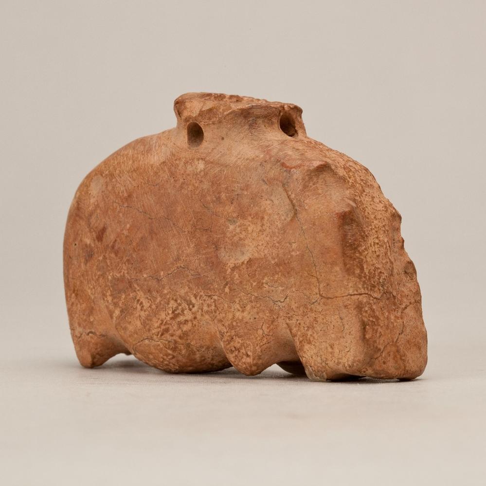 Charms of the Nile valley_Predynastic Pink Limestone Hippopotamus Amulet.jpg